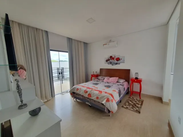 Casa de alto padrão com 433 m² e piscina no Xororó II — foto 15